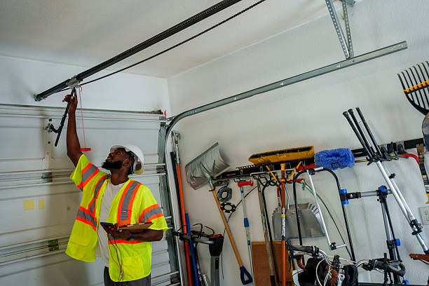 Professional Garage Door Panel Replacement technician working in Elmore, OH